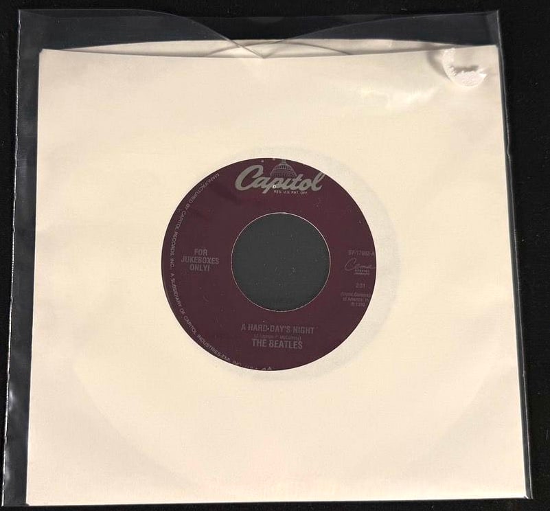 The Beatles - "A Hard Day's Night" / "Things We Said Today" Capitol Purple Label Jukebox 45 RPM: Capitol Records purple-label jukebox reissue 45 RPM single featuring "A Hard Day's Night" backed with "Things We Said Today."