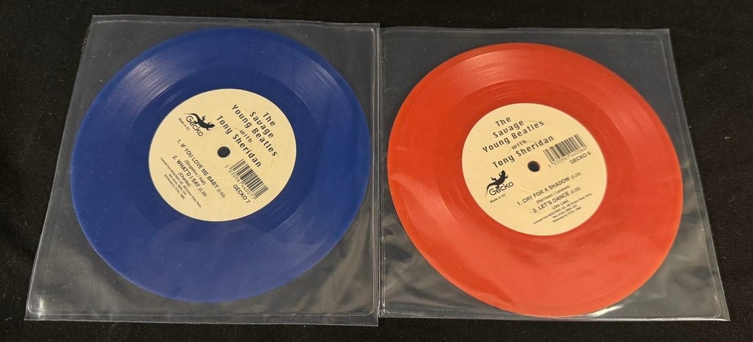 The Savage Young Beatles with Tony Sheridan - Blue & Red Colored Vinyl 7" Singles: Companion pair of collectible colored vinyl 7-inch singles featuring early Tony Sheridan recordings with The Beatles. The Savage Young Beatles with Tony Sheridan Cry for a shadow red vinyl and If you 