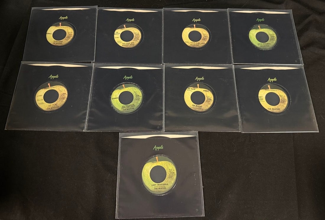 Lot of 9 Beatles Apple 45s with company sleeves (1 of 2)
