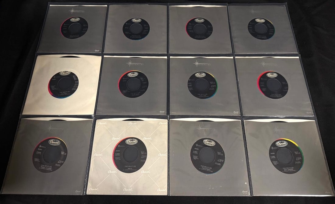 Lot of 12 Beatles 45s 80s pressings with company sleeves (1 of 2)