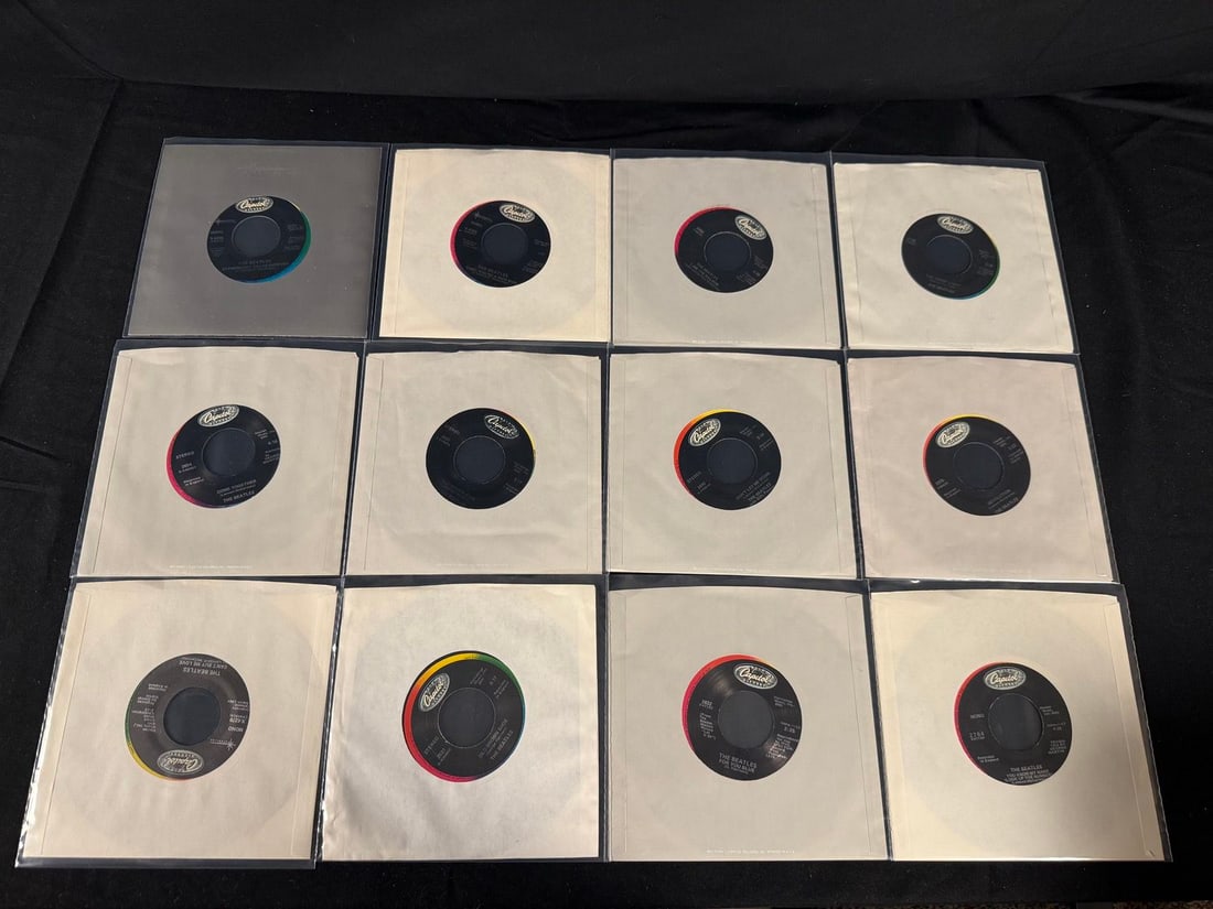 Lot of 12 Beatles 45s 80s pressings with company sleeves (1 of 2)