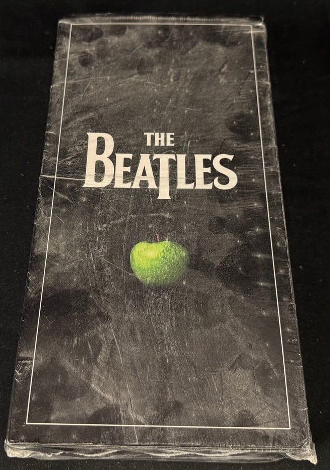 The Beatles Original Studio Recordings USB Box: Factory sealed Beatles USB apple containing the complete remastered studio catalog and bonus content.