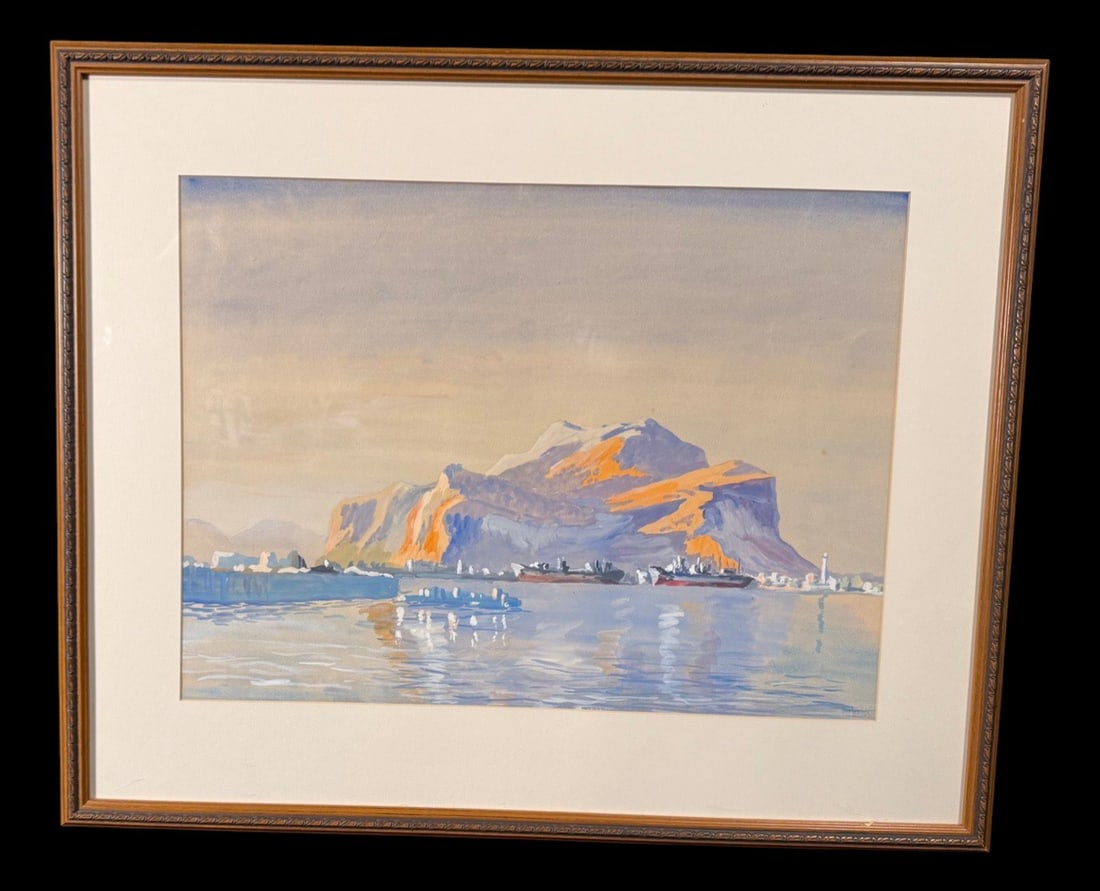 Framed Signed Coastal Mountain Harbor Watercolor: The painting appears to be an original watercolor depicting a coastal harbor with a prominent mountain or rock formation, cargo ships, and a lighthouse. It is signed in the lower right corner, though