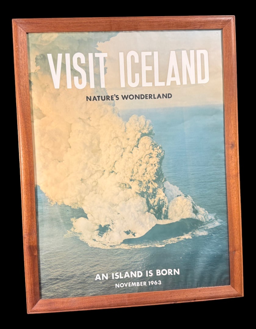 'Visit Iceland - Nature's Wonderland' Framed: Full title: 'Visit Iceland - Nature's Wonderland' Framed Travel Poster Framed reproduction travel poster reading 'Visit Iceland - Nature's Wonderland - An Island Is Born, November 1963,' featuring