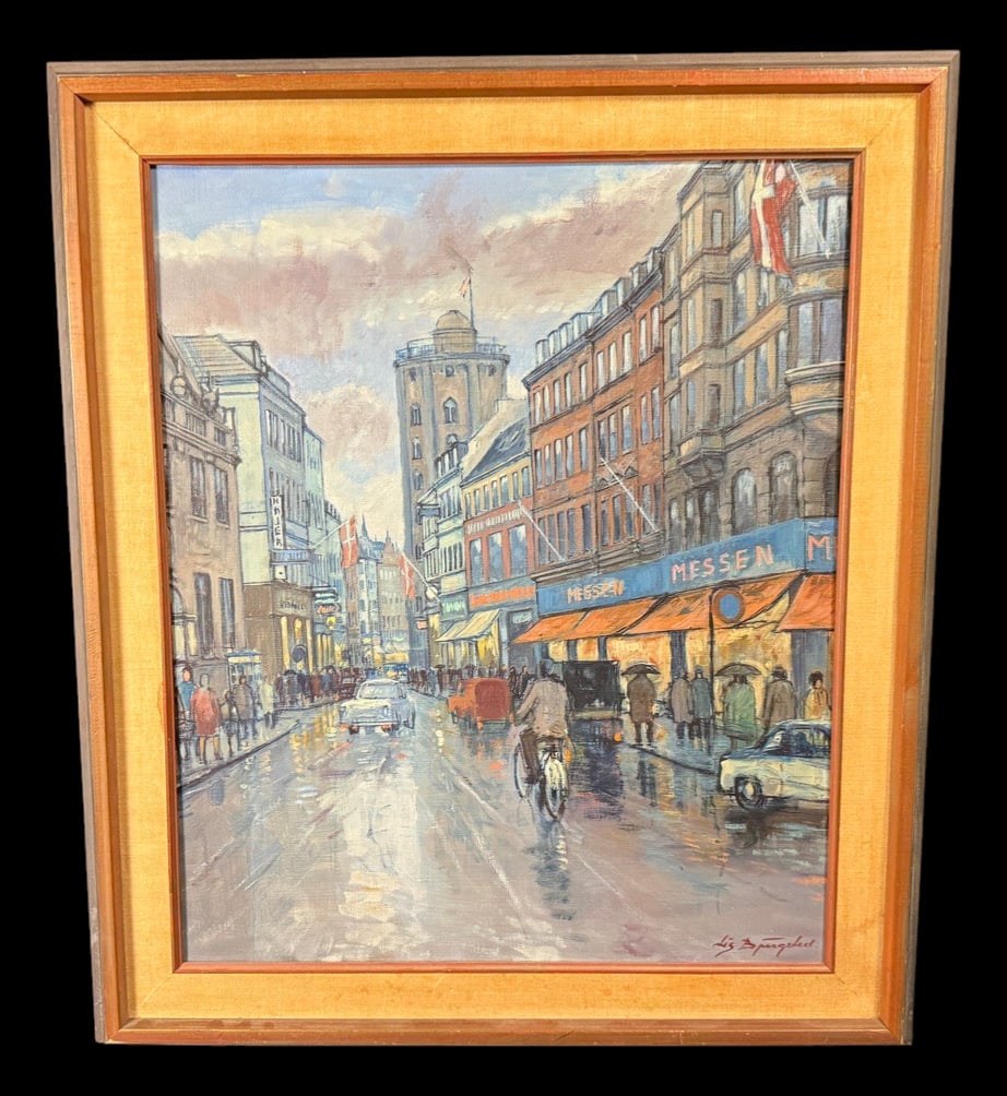 Signed European Street Scene Painting: Full title: Signed European Street Scene Painting ('Købmagergade') Original framed oil painting depicting a rainy street scene on Købmagergade (Copenhagen, Denmark), featuring period automobiles,