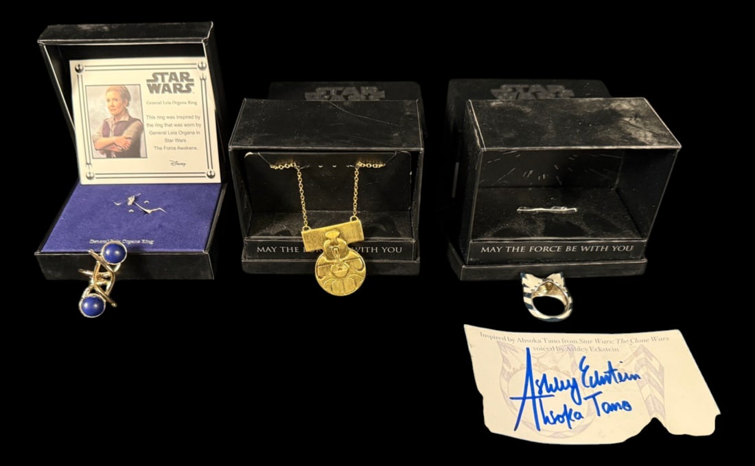 Star Wars Rock Love Collection: RockLove Star Wars Mandalorian necklace, Ashoka ring, and General Leia Organa ring. Featuring Ashley Eckstein (voice of Ahsoka Tano) autographed card.