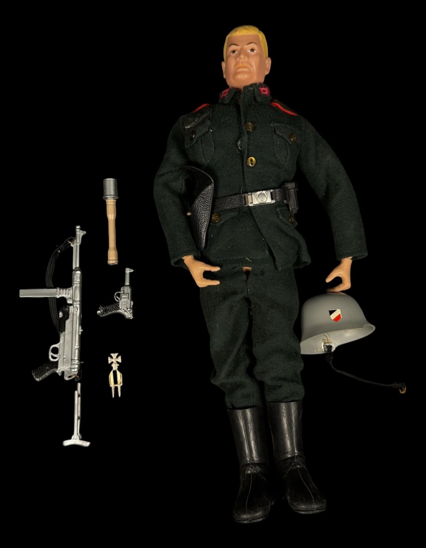 Vintage 1964 G.I. Joe German Soldier Figure: 1964 12-inch G.I. Joe German Soldier action figure with uniform, helmet, boots, belt, and assorted accessories.
