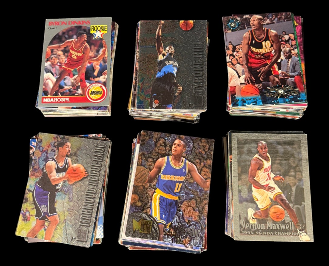 Large Loose Lot of Vintage NBA Basketball Cards: Assorted vintage NBA Basketball trading cards featuring players from multiple teams and sets.