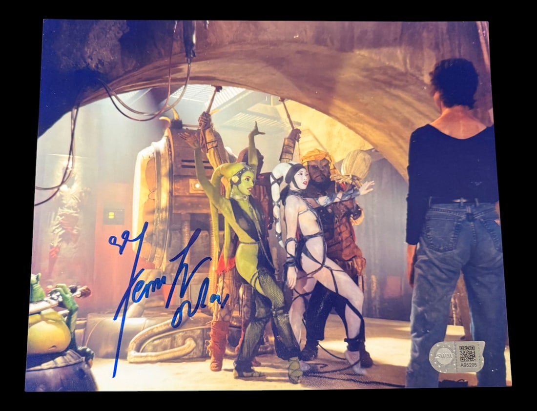 Signed Behind-the-Scenes Photograph of Jabba's: Full title: Signed Behind-the-Scenes Photograph of Jabba's Palace Signed by Femi Taylor with SWAU COA Signed behind the scenes photograph of Jabba's Palace from Star Wars signed by Femi Taylor, green