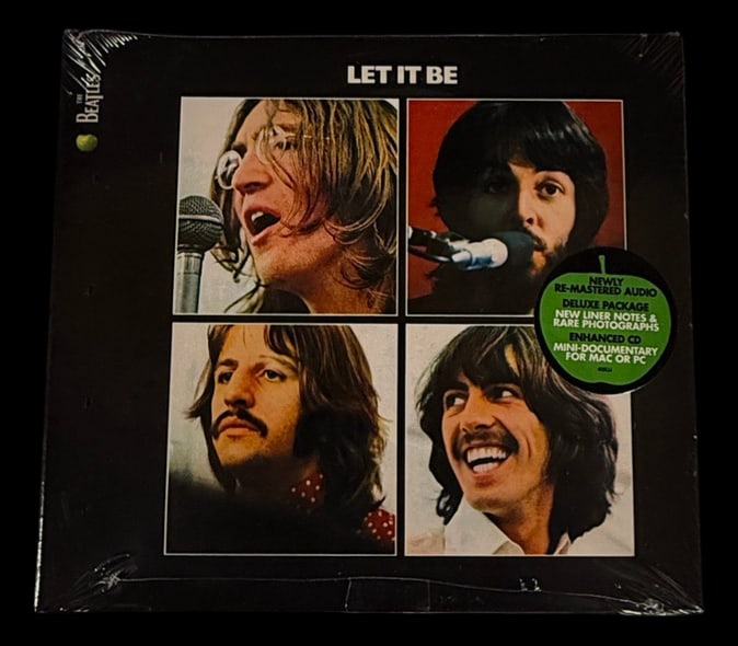 Let It Be (2009 Stereo Remaster Deluxe CD): Factory sealed deluxe edition of Let It Be from the 2009 Beatles remaster campaign, complete with enhanced packaging, photographs, and bonus multimedia features.