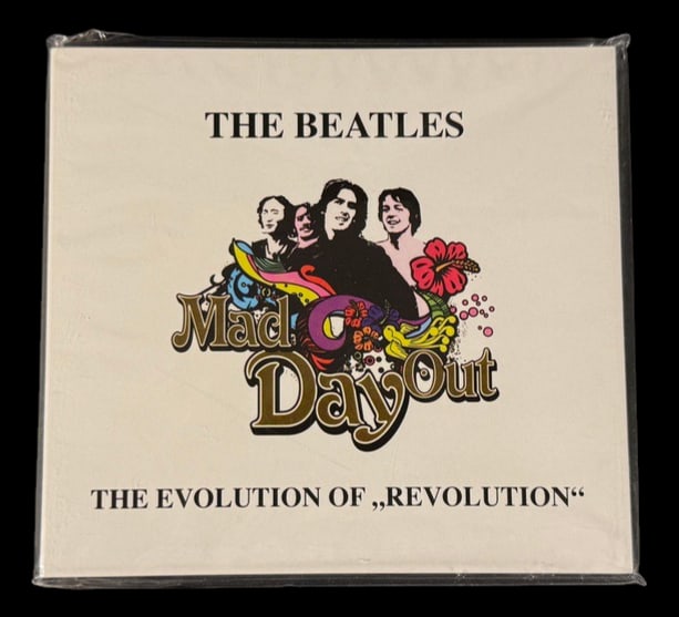 Mad Day Out: The Evolution of 'Revolution' CD: Collectible Beatles archival CD focusing on the development and evolution of 'Revolution,' featuring alternate recordings and studio material.