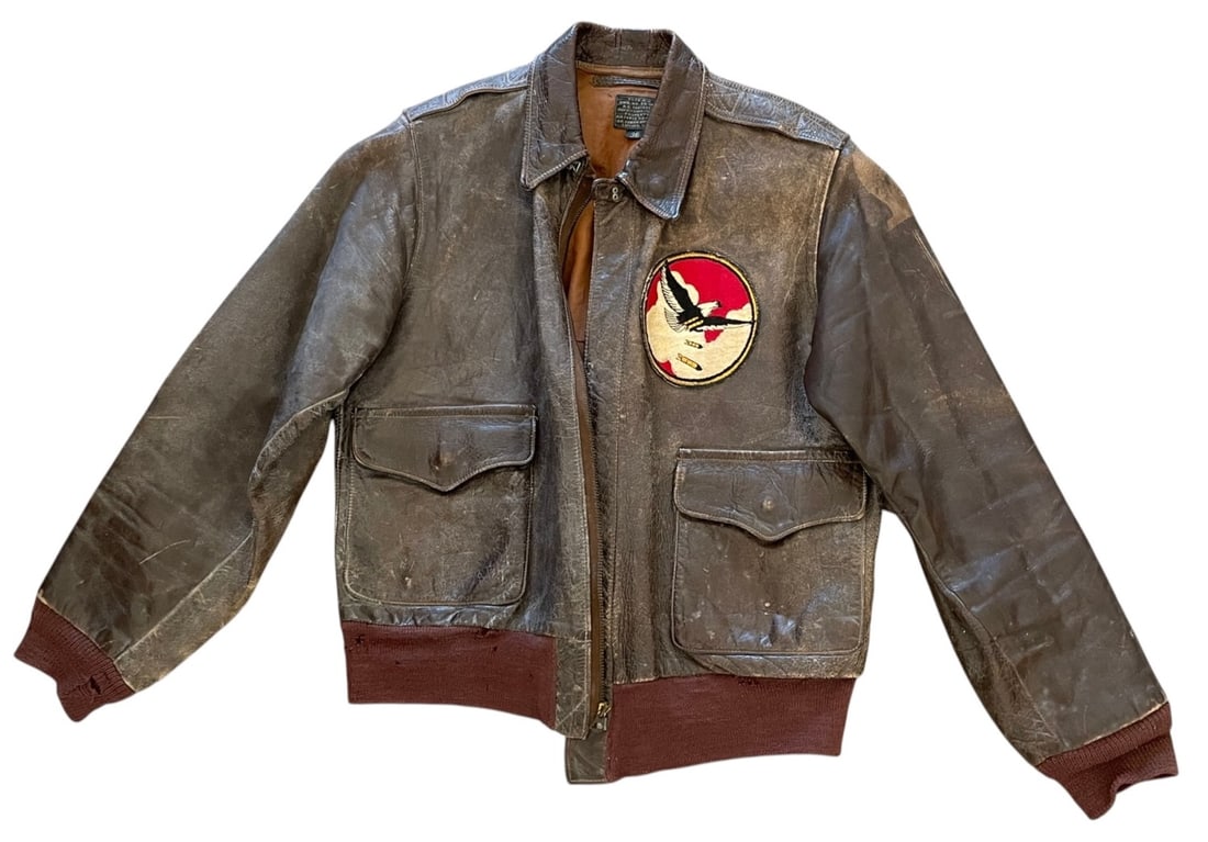 WWII 718th BS Type A-2 Flight Jacket - J.A. Dubow: Original World War II U.S. Army Air Forces Type A-2 leather flight jacket, manufactured by J.A. Dubow Mfg. Co., Chicago, Illinois, size 38, retaining its original wartime specification label. The labe