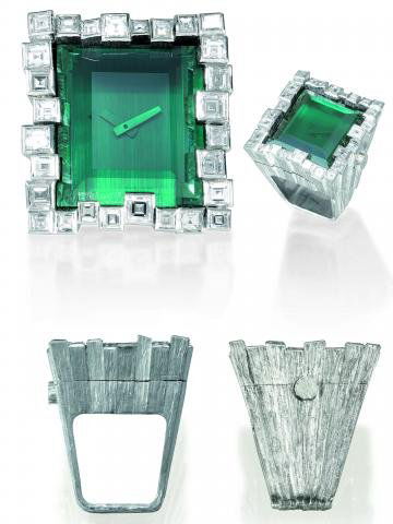 URSULA ANDRESS RING WATCH Omega, No. 32331944: URSULA ANDRESS RING WATCH Omega, No. 32331944, Ref. AT 651.002 / Grima 6765. Sold on February 4, 1972. Very fine, unusual, rectangular, diamond, platinum, and tourmaline ring watch by Andrew Grima. Th