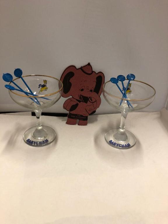 2 Babysham Glasses, 6 Babysham Cocktail sticks and Pink: 2 Babysham Glasses, 6 Babysham Cocktail sticks and Pink Elephant Beer Mat