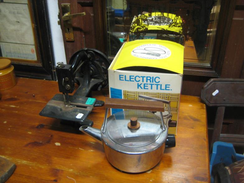An Antique Wanzer Hand Sewing Machine; Electric Kettle (1 of 1)