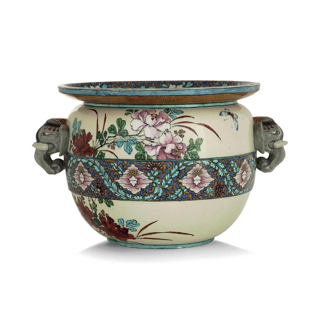 THÉODORE DECK (1823-1891) JARDINIÈRE: THÉODORE DECK (1823-1891) JARDINIÈRE CIRCULAIRE, VERS 1870 en faïence munie de deux anses en forme de tête d’éléphant, à décor polychrome d’une fris