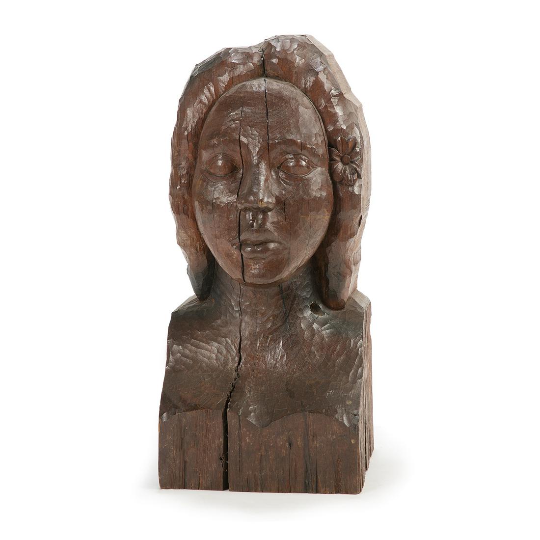 GEORGES LACOMBE (ATTRIBUÉ À) VAHINÉ Sculpture en taille: GEORGES LACOMBE (ATTRIBUÉ À) VAHINÉ Sculpture en taille directe dans un bloc d'acajou, coiffure animée d'une fleur. A mahogany wood sculpture, direct carving technique. H 56,5 x L