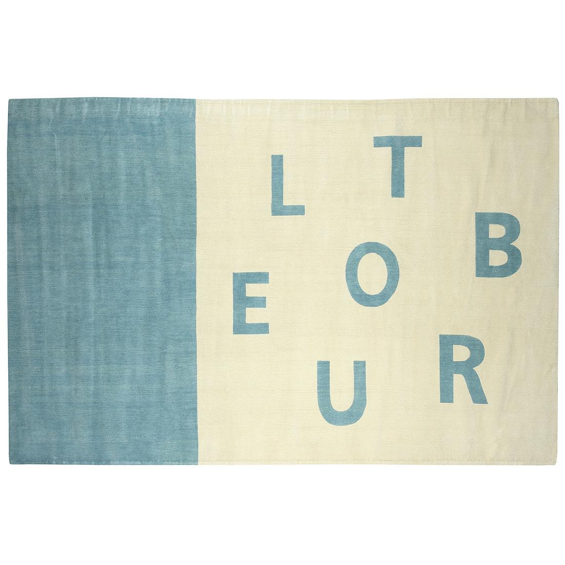 PHILIPPE CAZAL (NÉ EN 1948) - CHEVALIER É: PHILIPPE CAZAL (NÉ EN 1948) - CHEVALIER ÉDITION TROUBLE, 2010 Tapis, tissé main, à points noués, en laine, présentant le mot "trouble" déstructuré en turquoise