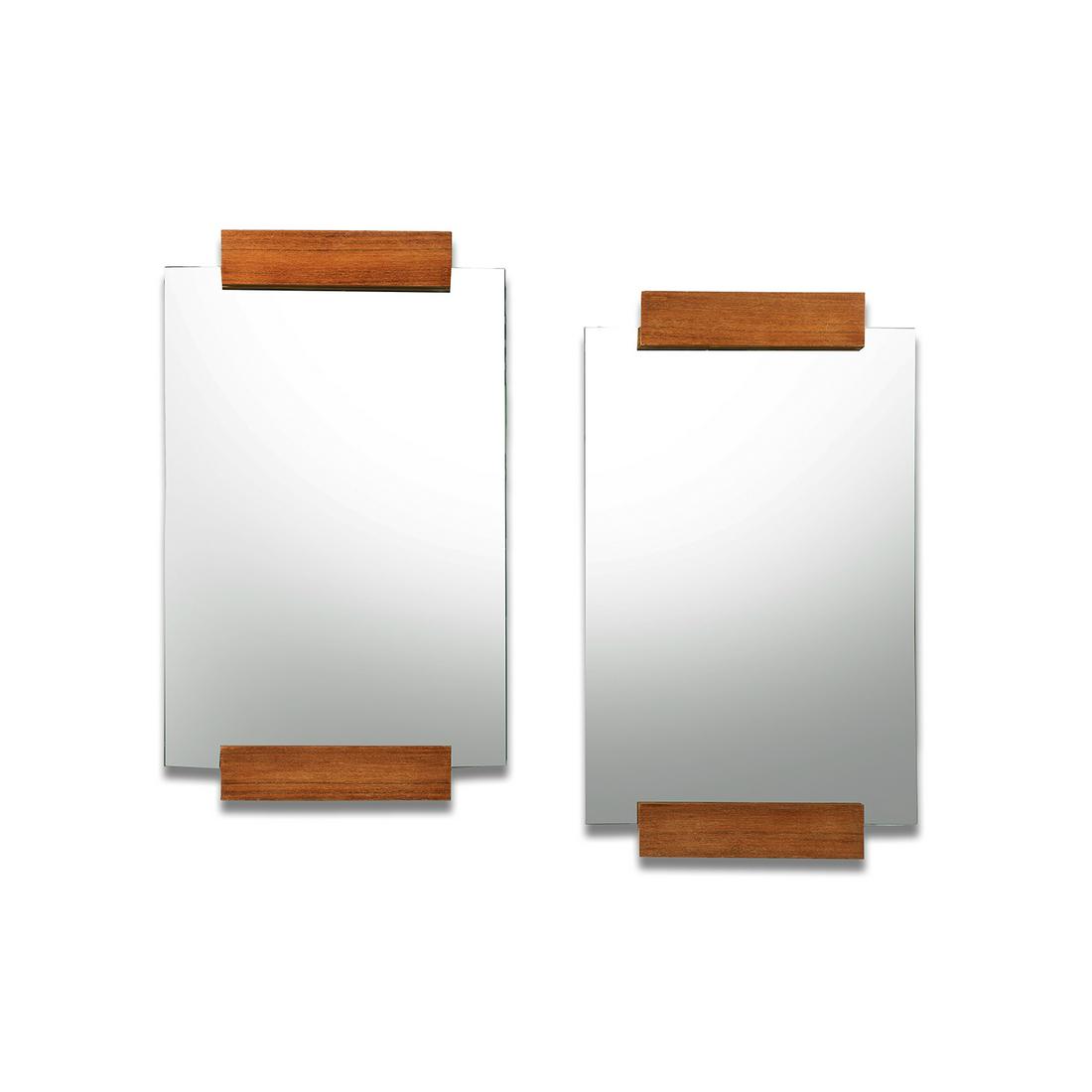 ANDRÉ SORNAY (1902-2000) Paire de miroirs: ANDRÉ SORNAY (1902-2000) Paire de miroirs modernistes, structure en contreplaqué maintenant deux lames de noyer verni enserrant le miroir. A pair of mirrors, plywood structure, two varnished