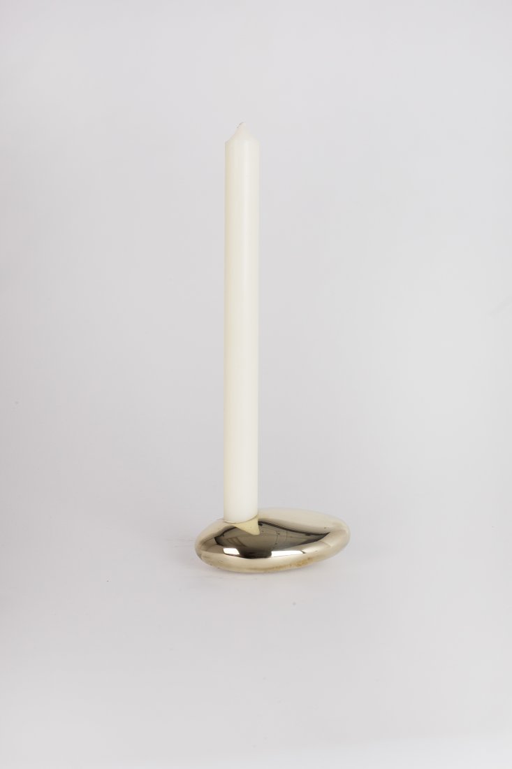 Stone Candleholder by Konekt - Single Set of Two: Konekt's Stone Candle Holders are inspired by the curves and contours of stones shaped by the ocean. The solid brass candle holders are cast at a Pennsylvania foundry from hand-shaped forms and are po