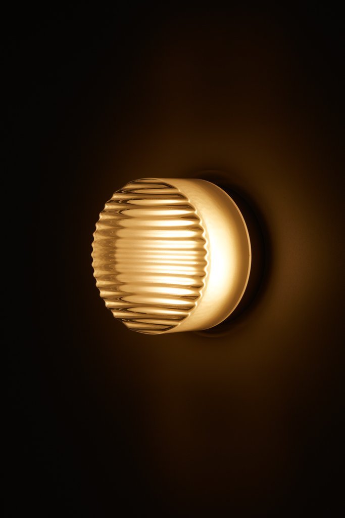 Crisp Sconces by Rich Brilliant Willing – Set of Two: Crisp is a simple, contemporary option for a flush-mounted light, molded from solid glass and fit for installation in the ceiling or wall and is suitable for wet locations. Its grooved front face, whi