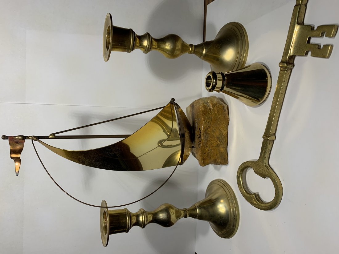 Brass Lot including Boat Sculpture: Boat sculpture is signed. Stands at 9 inches tall, the large brass key is 7 inches long. This lot also includes a nice brass kaleidoscope.