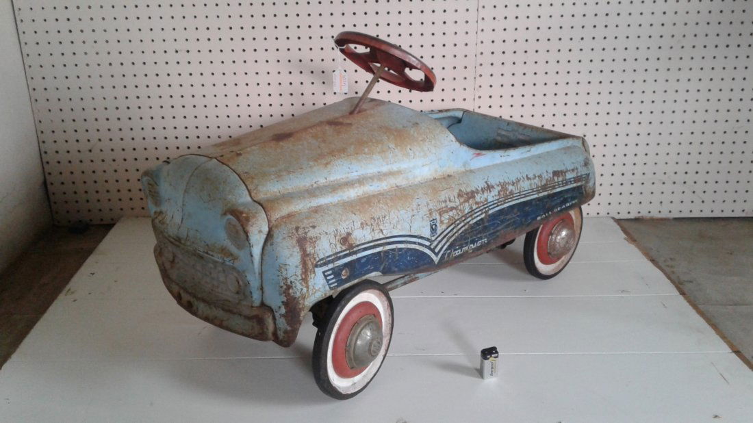 Murray Vintage Ball Bearing Champion Pedal Car: Murray Vintage Ball Bearing Champion Pedal Car. Has all four hub caps and steering wheel. In working condition.
