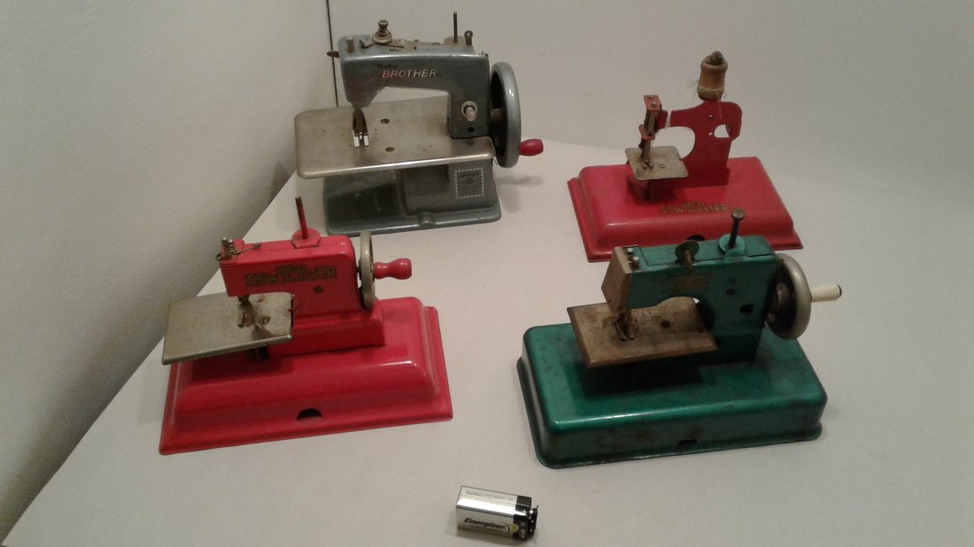 4 childs sewing machines: 1 baby brother sewing machine, 1 green sewing machine, 2 KanEE sew master machines