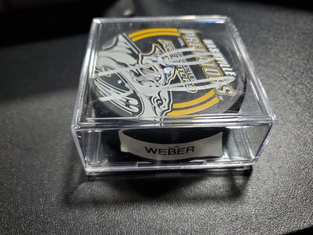 YANNICK WEBER SIGNED NASHVILLE PREDATORS HOCKEY PUCK: YANNICK WEBER SIGNED NASHVILLE PREDATORS HOCKEY PUCK