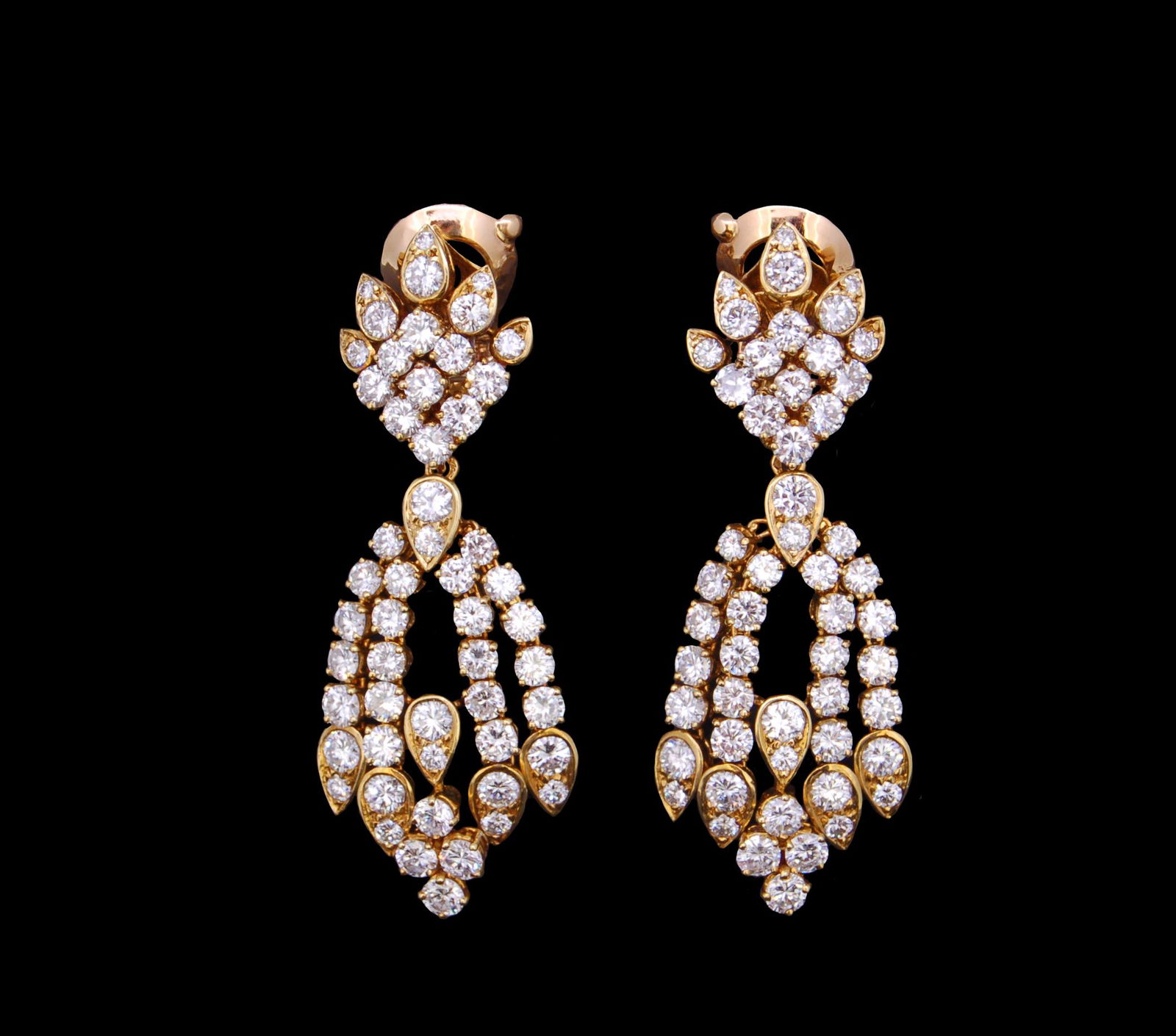 VAN CLEEF & ARPELS DIAMOND DROP EARRINGS: VAN CLEEF & ARPELS, IMPORTANT PAIR OF 18ct GOLD DIAMOND DROP CHANDELIER EARRINGS, the tops set with brilliant round cut diamonds, suspending a diamond set chandelier drop. The chandelier drops are rem