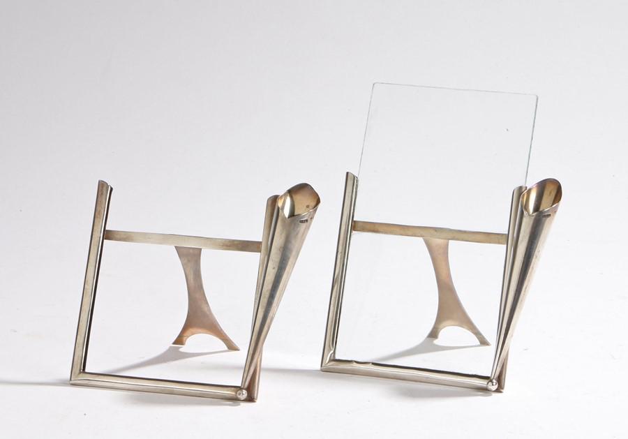 Pair of Victorian silver picture frames: Pair of Victorian silver picture frames, Chester 1898, maker Stokes & Ireland Ltd, each with a posy holder to the right hand side, with easel backs, one with glass, 11cm wide, 13.5cm high including gl
