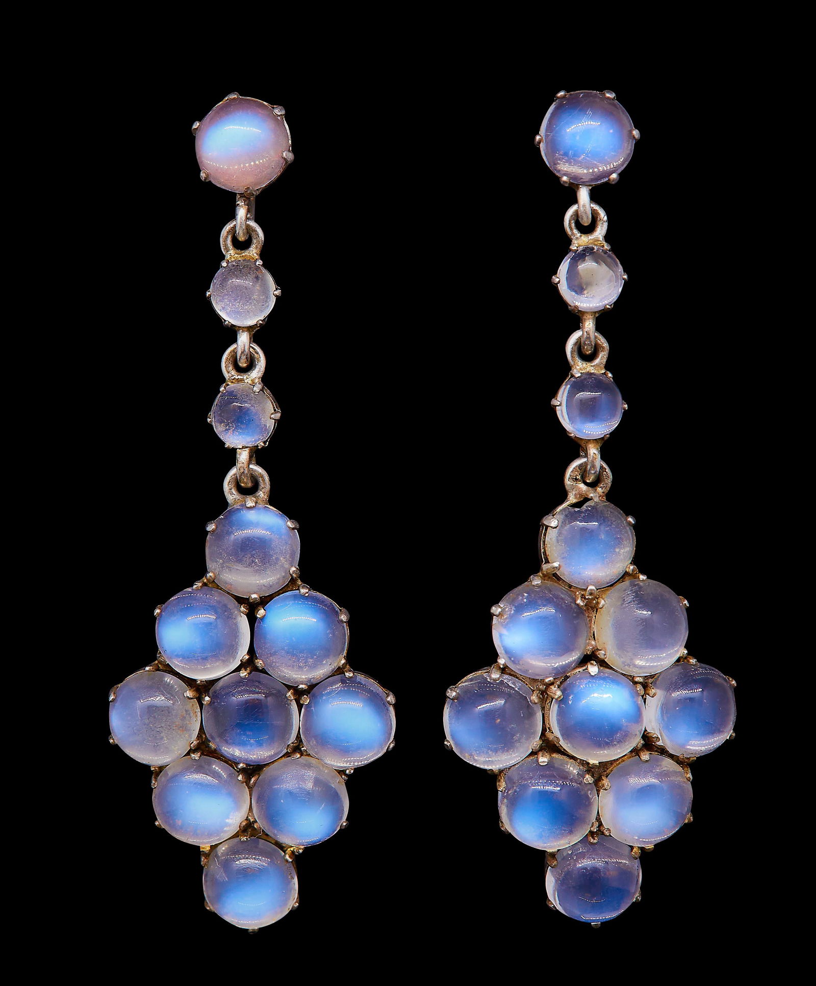 PAIR OF MOONSTONE DROP EARRINGS: PAIR OF MOONSTONE DROP EARRINGS, the top set with a moonstone, suspending a 2 stone drop with a larger diamond shaped moonstone drop. L. 4.4 cm. 5.3 grams.