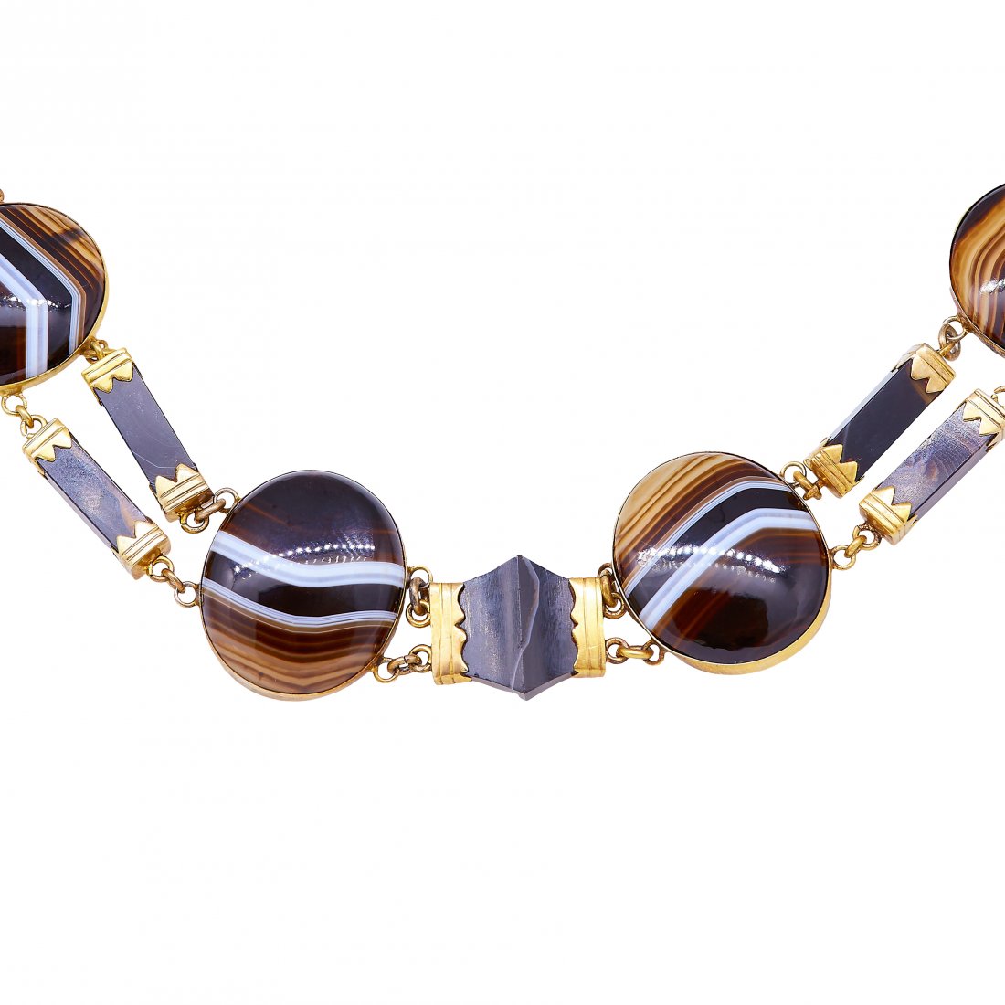 ANTIQUE VICTORIAN BANDED AGATE NECKLACE: ANTIQUE VICTORIAN BADED AGATE NECKLACE, the oval cabochon cut banded agate set links alternated with a double bar link and a carved onyx link. L. 38 cm. 53.3 grams.