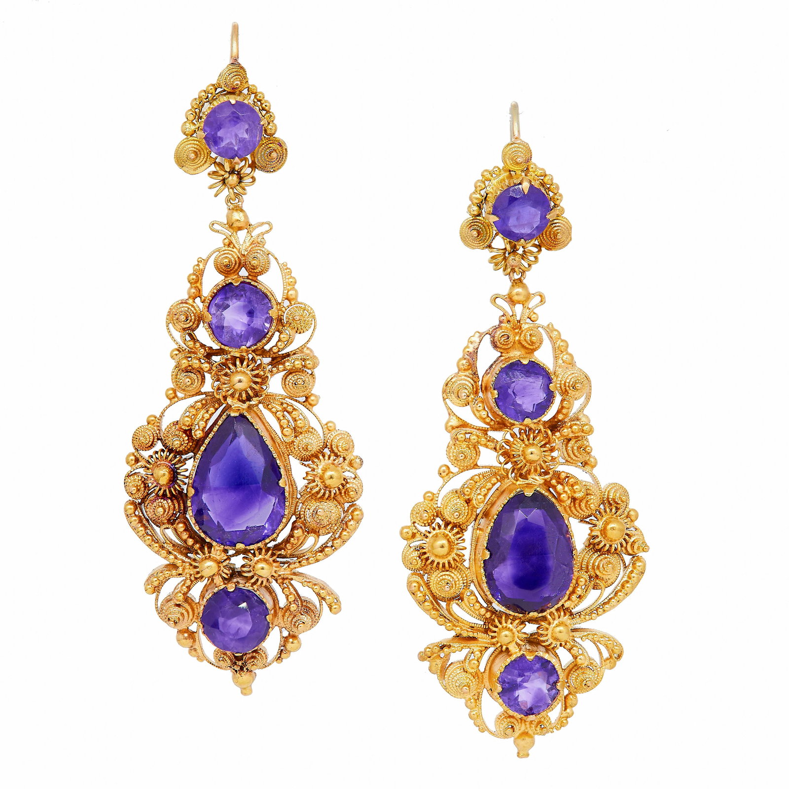ANTIQUE PAIR OF AMETHYST AND OPENWORK DROP EARRINGS: ANTIQUE PAIR OF AMETHYST AND OPENWORK DROP EARRINGS, of openwork wirework and scrolling design, the top set with a single amethyst, the drop set wot 2 smaller and 1 larger amethyst. L. 5.6 cm. 15.6 gr