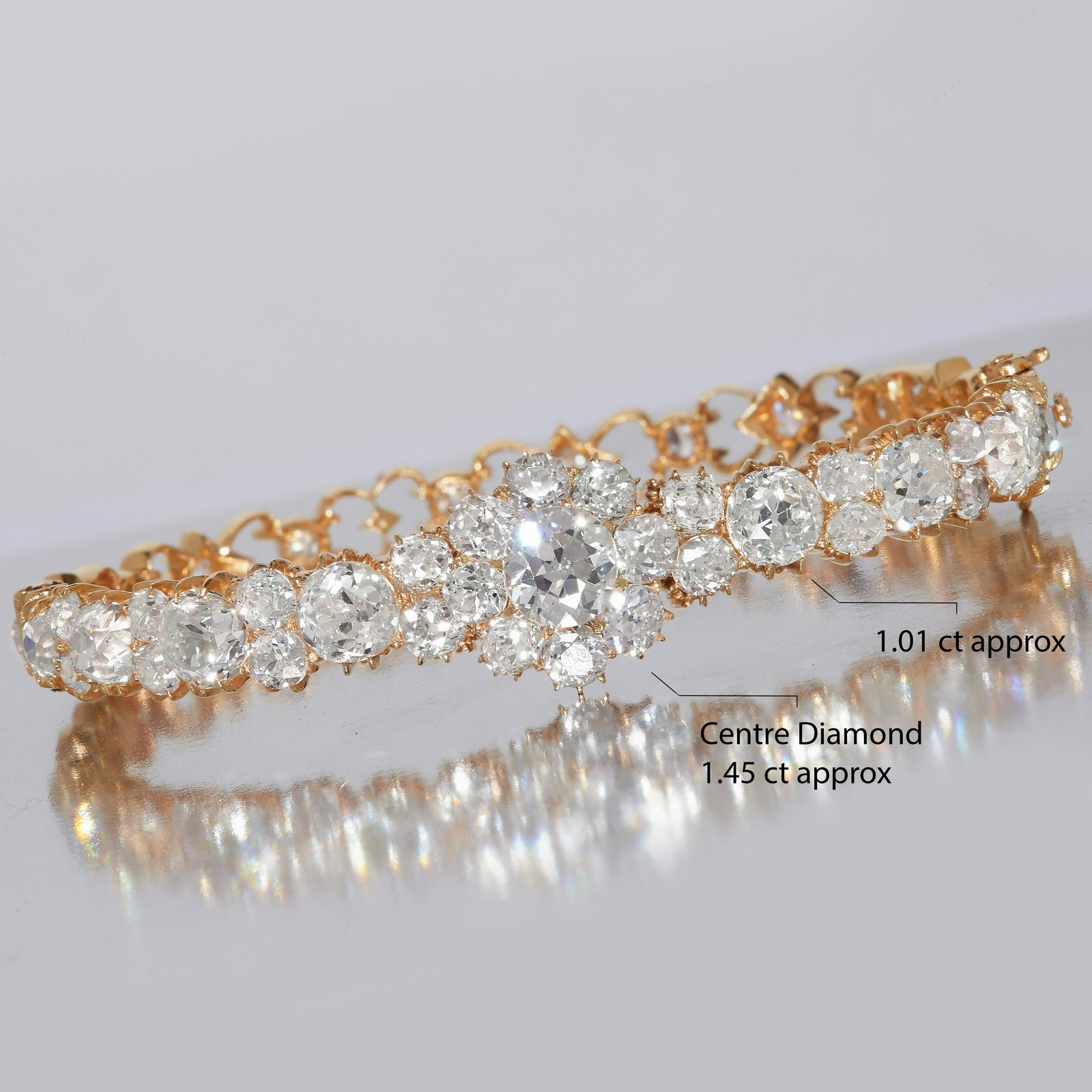 IMPORTANT DIAMOND HINGED BANGLE (1 of 2)