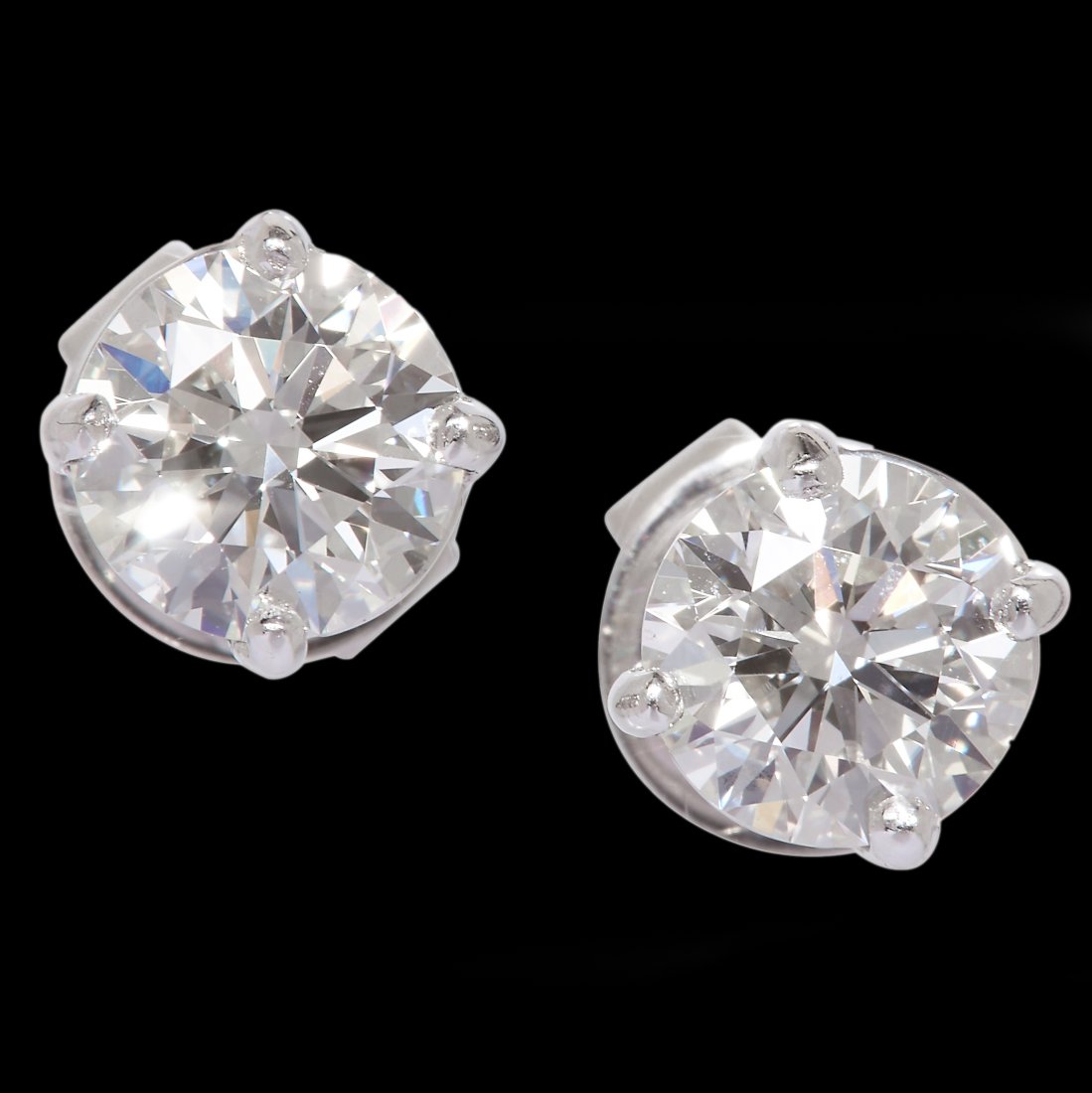 PAIR OF DIAMOND SINGLE STONE STUD EARRINGS (1 of 2)