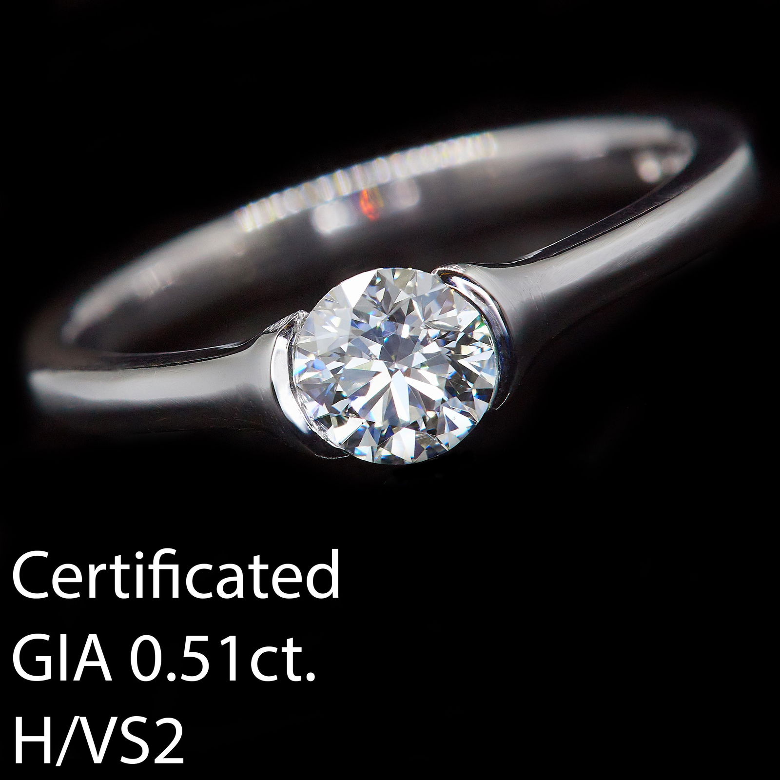 DIAMOND SOLITAIRE RING (1 of 2)