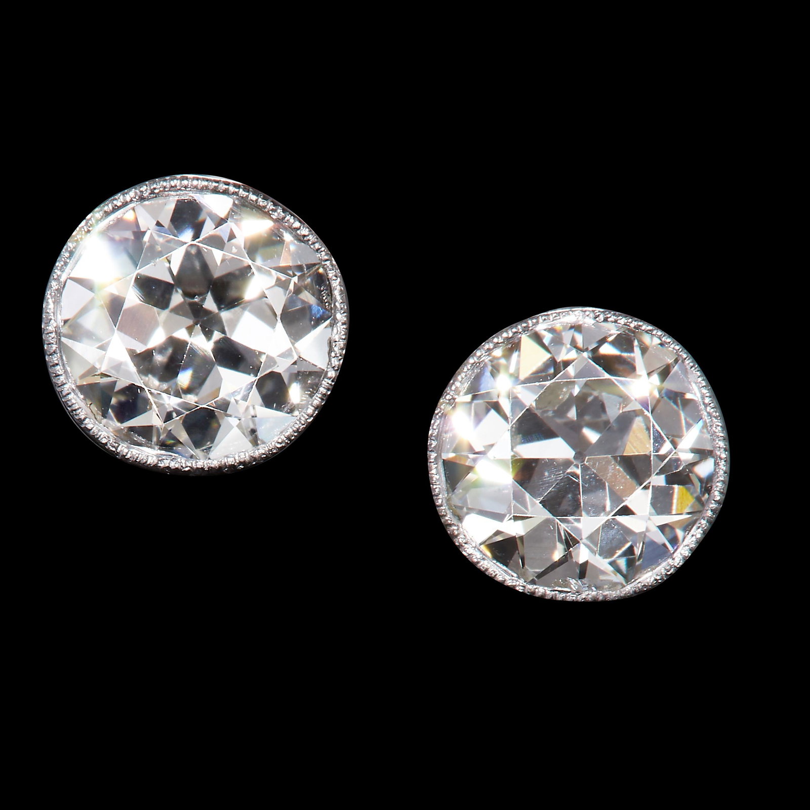 PAIR OF DIAMOND SINGLE STONE STUD EARRINGS (1 of 1)