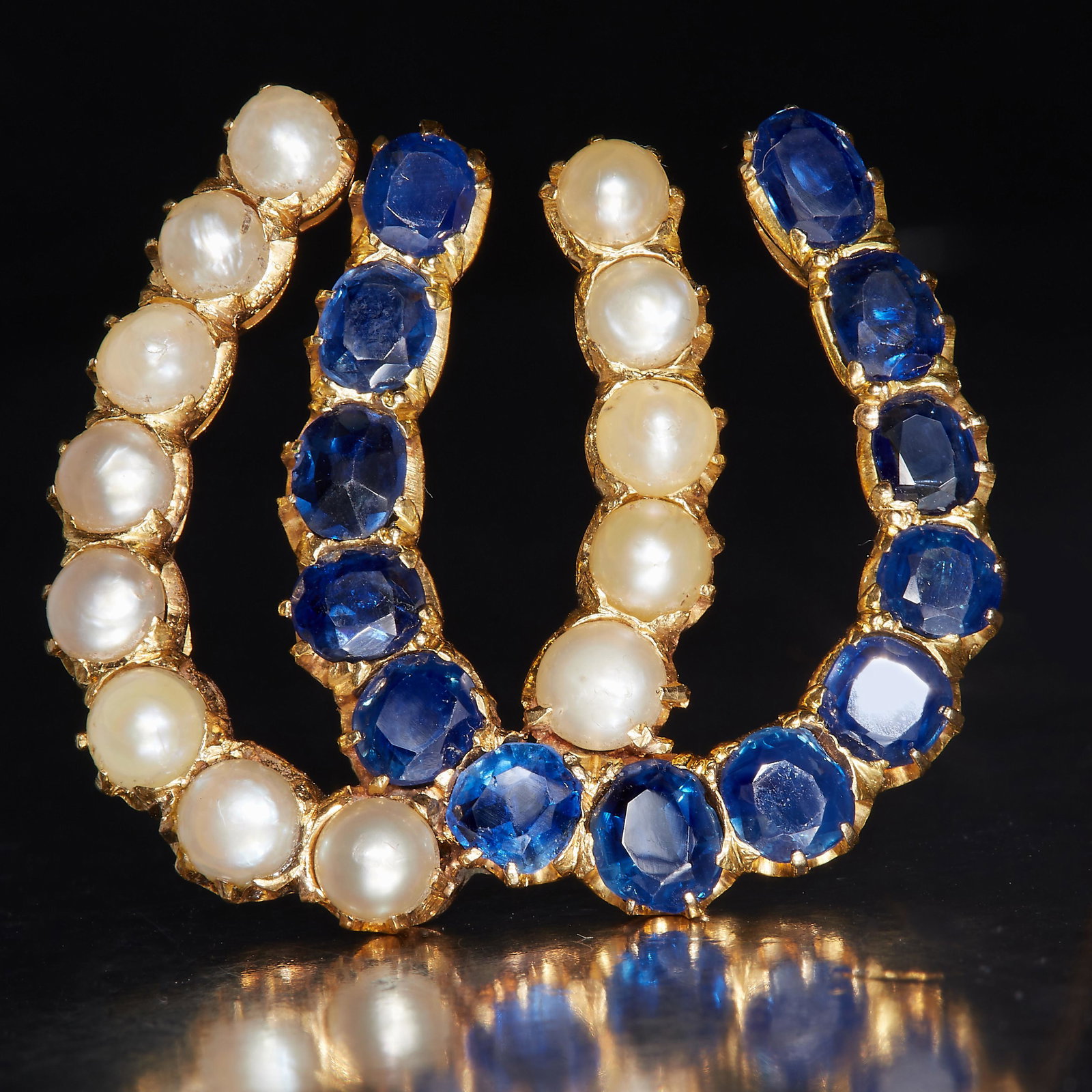 ATTRACTIVE BLUE SAPPHIRE AND PEARL DOUBLE HORSE SHOE BROOCH (1 of 1)