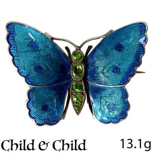 CHILD AND CHILD, PERIDOT AND ENAMEL ENAMEL BUTTERFLY BROOCH: CHILD AND CHILD, PERIDOT AND ENAMEL ENAMEL BUTTERFLY BROOCH,Vibrant peridot, well matched.Beautiful multicolor enamel.Makers mark Child and Child.W. 3.6 cm,13.1 grams.Fine brooch, enamel in good