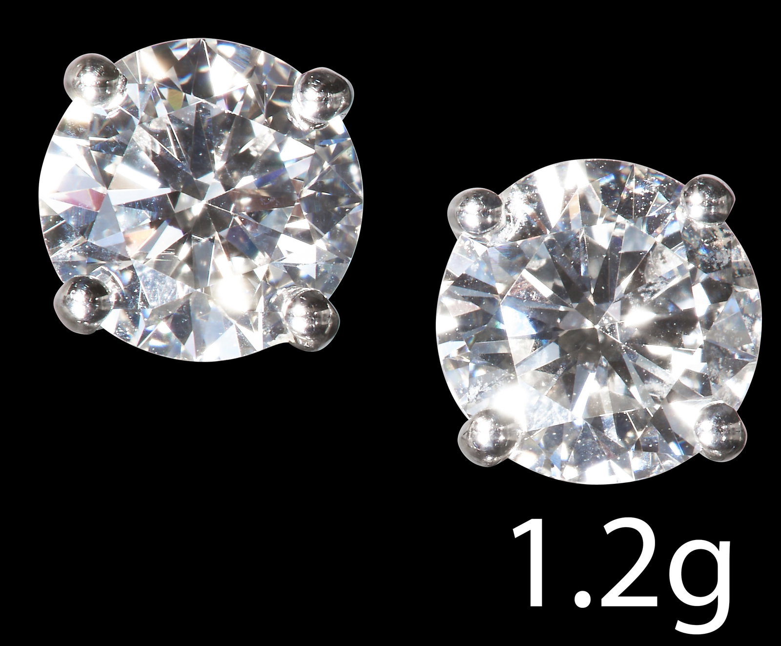 PAIR OF DIAMOND STUD EARRINGS: PAIR OF DIAMOND STUD EARRINGS18 ct. gold.Diamonds totalling approx. 1.34 ct. G-H colour, VS clarity.1,2 grams.Good condition.
