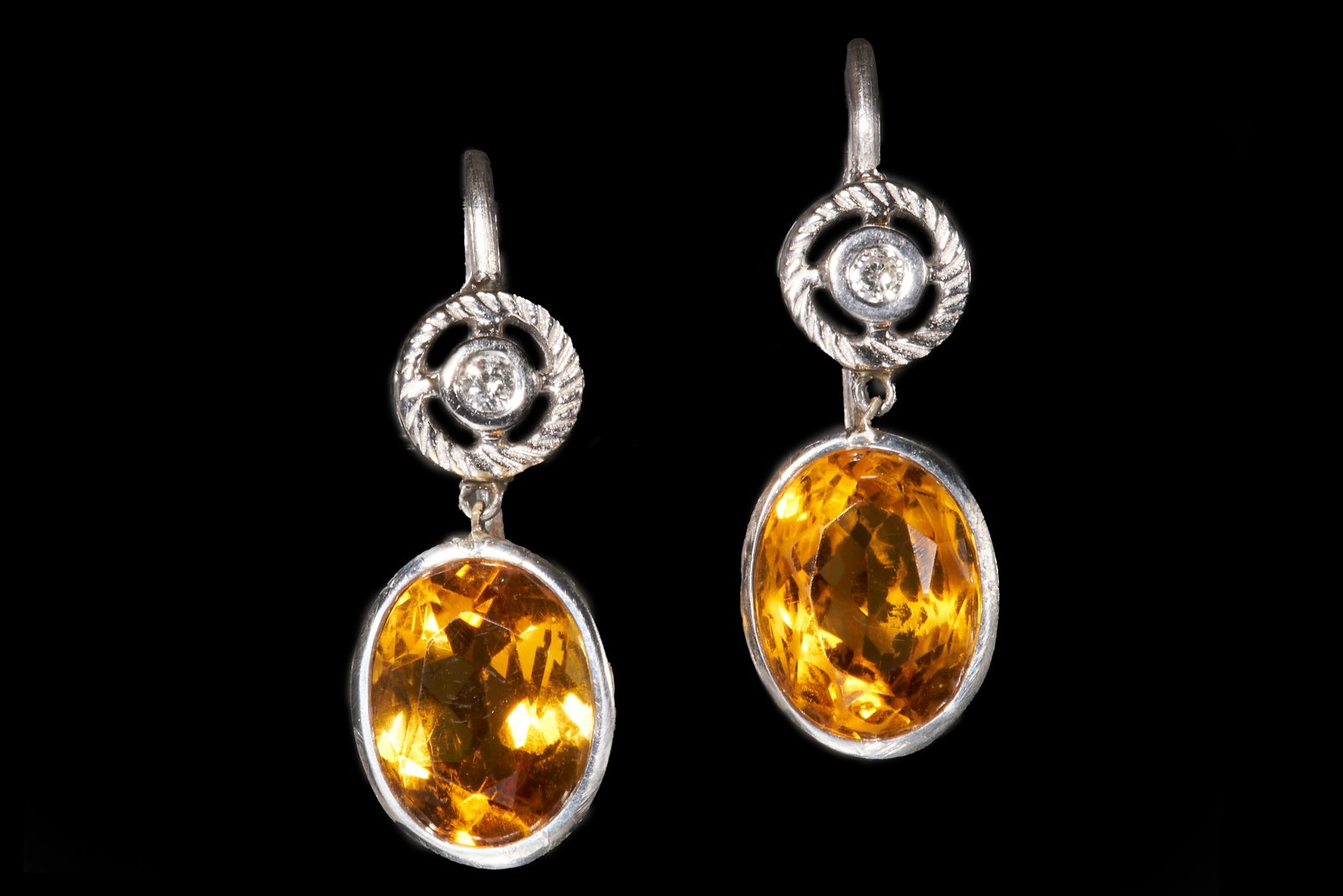 FINE PAIR OF DIAMOND AND TOPAZ EARRINGS: FINE PAIR OF DIAMOND AND TOPAZ EARRINGS,High carat gold.Topaz well matched in colour.L. 2.2 cm.3 grams.