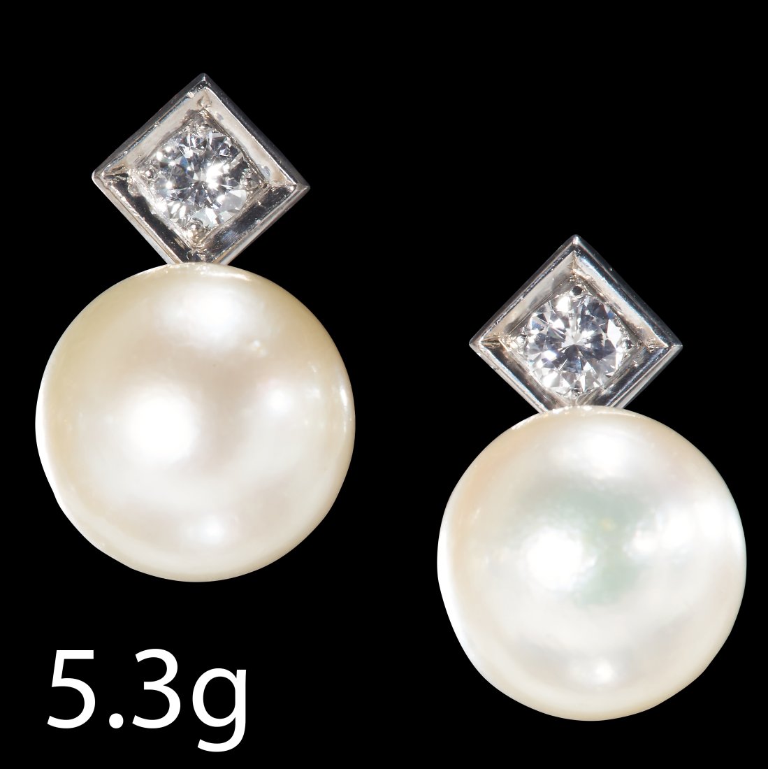 PAIR OF PEARL AND DIAMOND EARRINGS: PAIR OF PEARL AND DIAMOND EARRINGS,High carat gold.Pearls of approx. 9.2 mm. (pearls untested).L. 1.5 cm.5.3 grams.