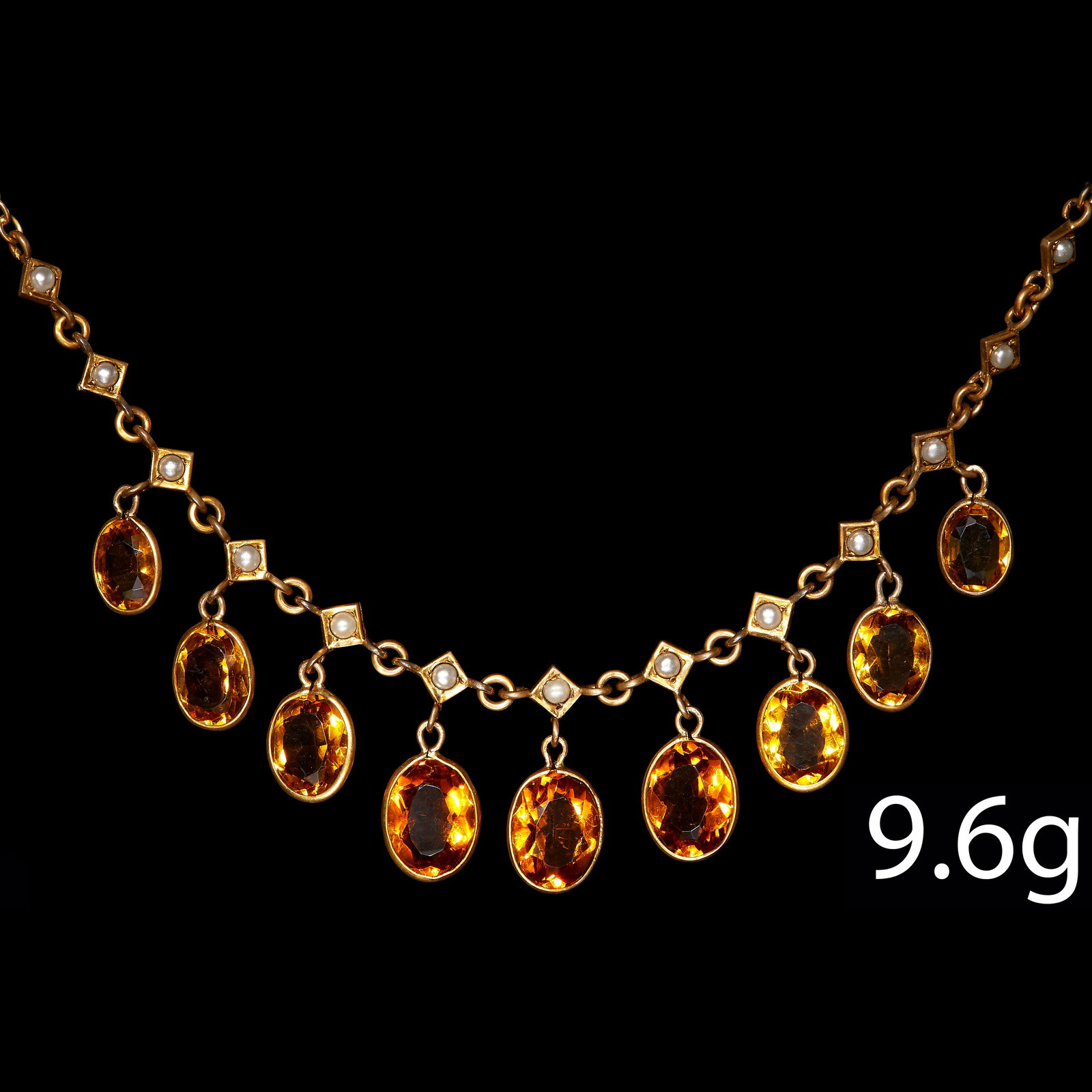 VICTORIAN CITRINE AND PEARL NECKLACE: VICTORIAN CITRINE AND PEARL NECKLACE, Suspending 9 vibrant citrine drops. L. 51 cm. 9.6 grams.No abrasions, in lovely and good wearable condition.