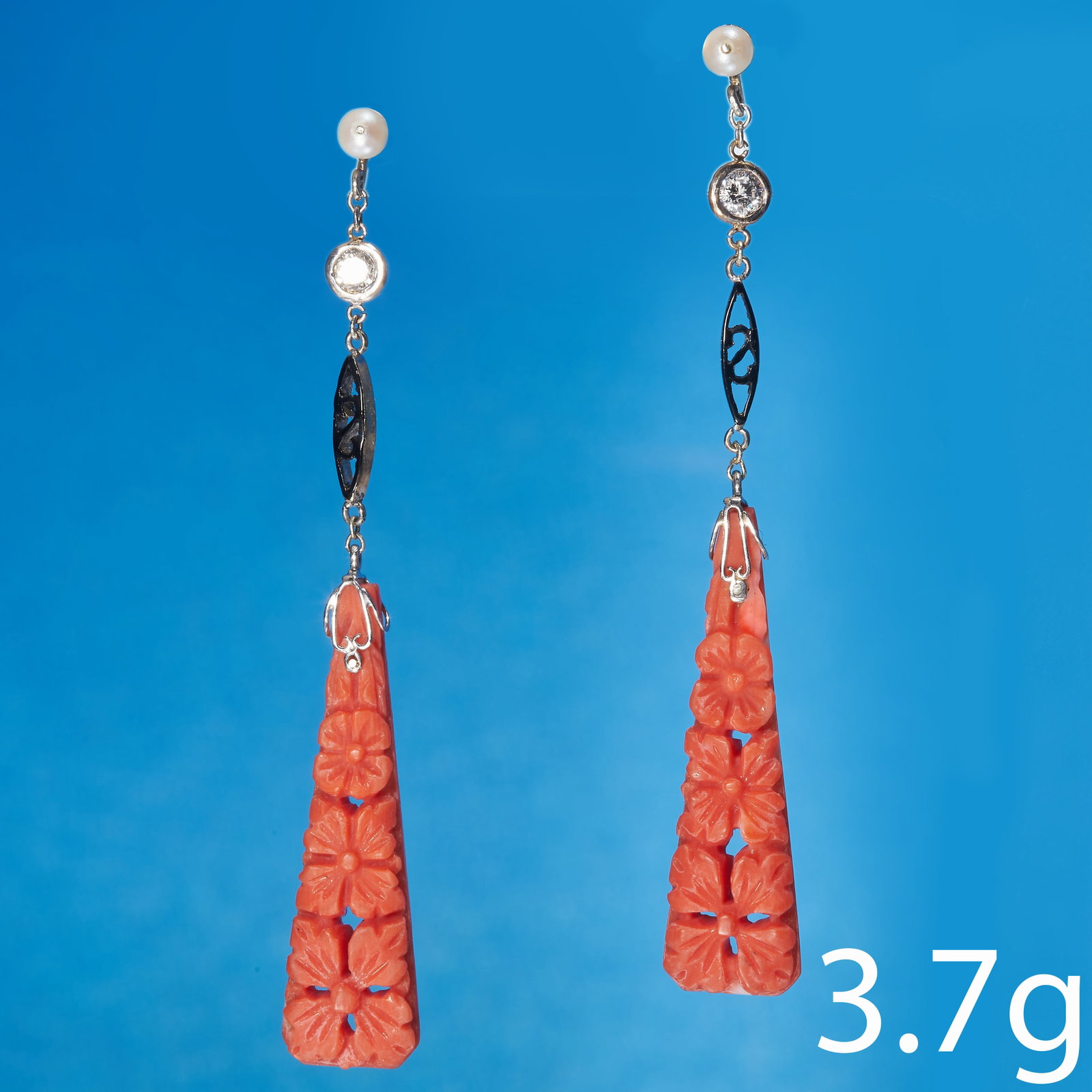FINE PAIR OF ART-DECO CORAL DIAMOND PEARL AND ENAMEL GOLD EARRINGS: FINE PAIR OF ART-DECO CORAL DIAMOND PEARL AND ENAMEL GOLD EARRINGS,Fine carved coral drop.Diamonds bright and lively.Enamel good condition.Pearls believed to be natural (untested).L. 5.6 cm.3.7 grams.