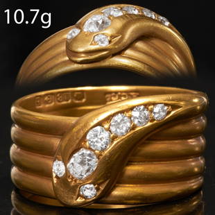 EDWARDIAN OLD CUT DIAMOND SNAKE RING: EDWARDIAN OLD CUT DIAMOND SNAKE RING18 ct. gold.Set with bright and lively old cut diamonds Size: T 1/210.7 gram.