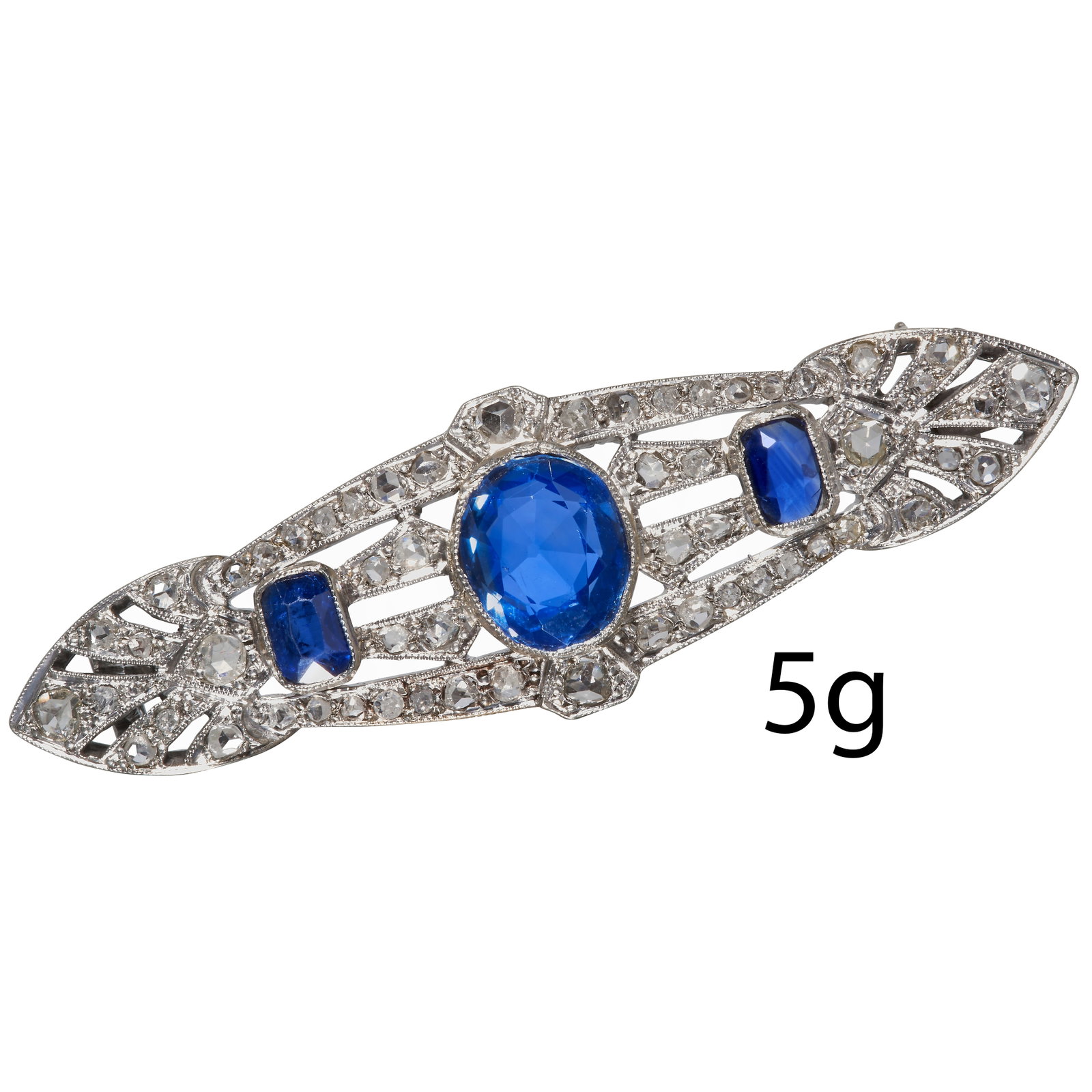 ART-DECO SAPPHIRE AND DIAMOND BROOCH: ART-DECO SAPPHIRE AND DIAMOND BROOCHPlatinum.Set with vibrant sapphires, totalling approx. 2.53 ct.diamonds bright and lively.W. 4.7 cm.5 grams.Fine brooch.