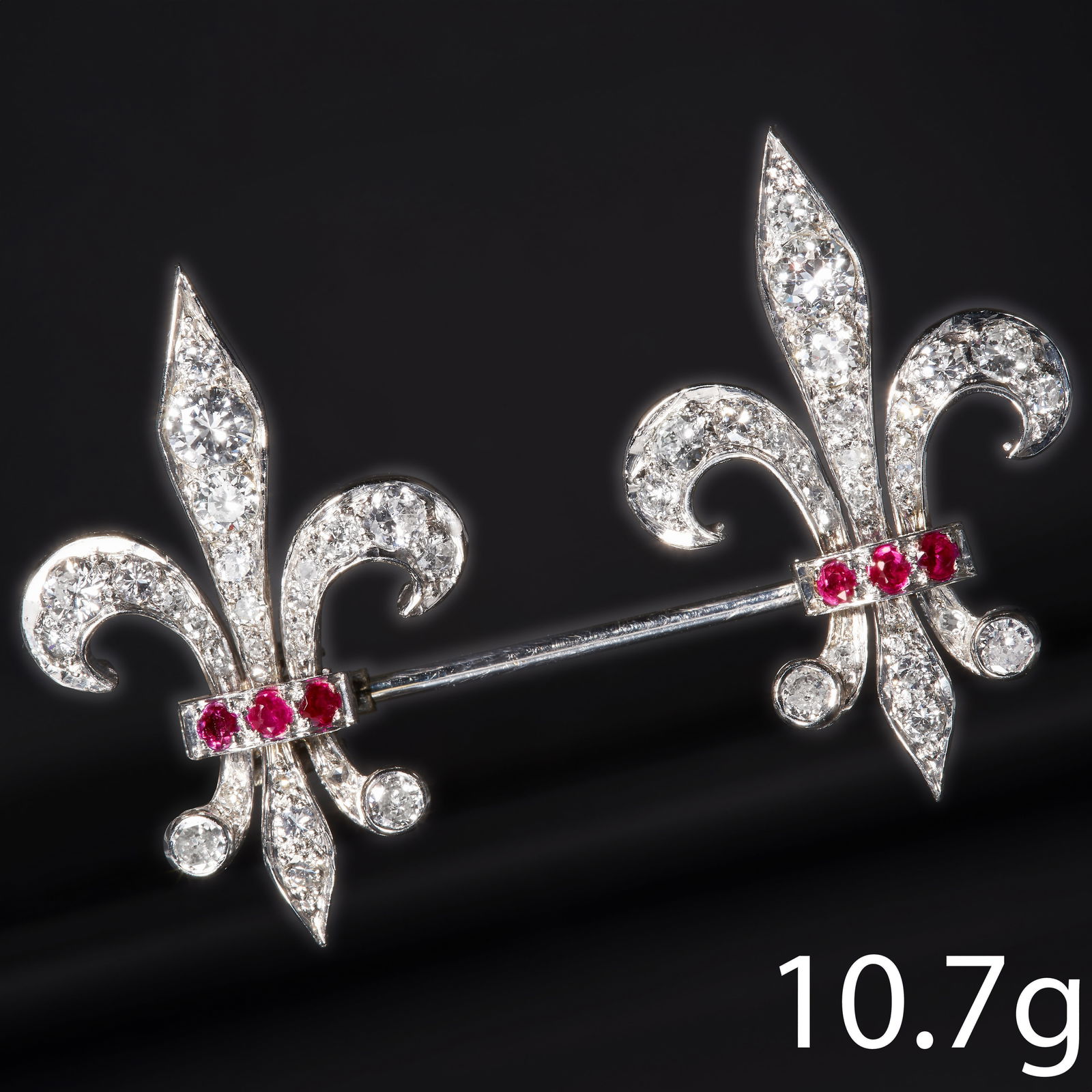 EARLY 20TH CENTURY RUBY AND DIAMOND FLEUR-DE-LYS JABOT PIN (1 of 1)