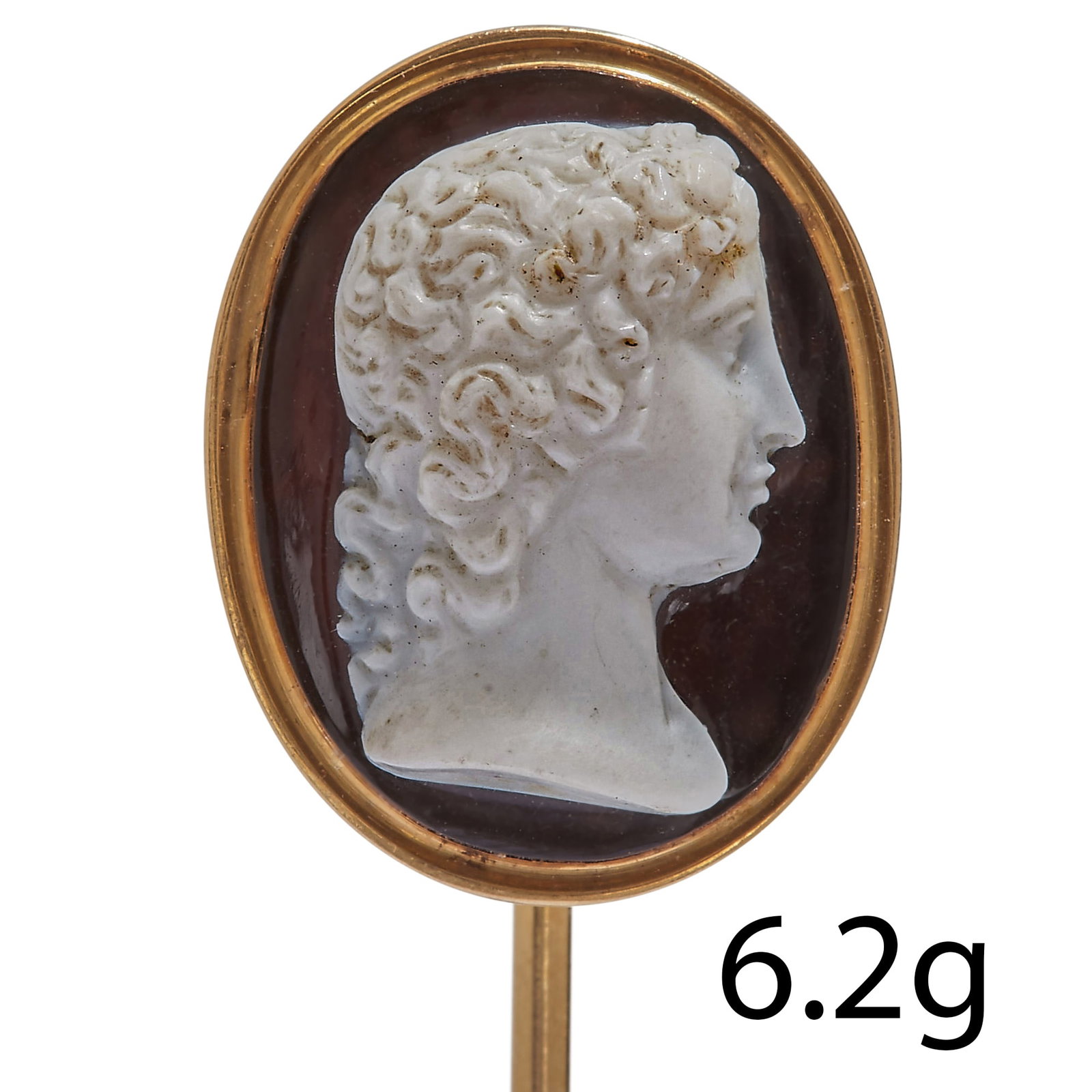 HARD STONE CAMEO STICK PIN: HARD STONE CAMEO STICK PIN, The carved cameo depicting a portrait in profile.L. cameo 18 mm.6.2 grams.Fine carving.
