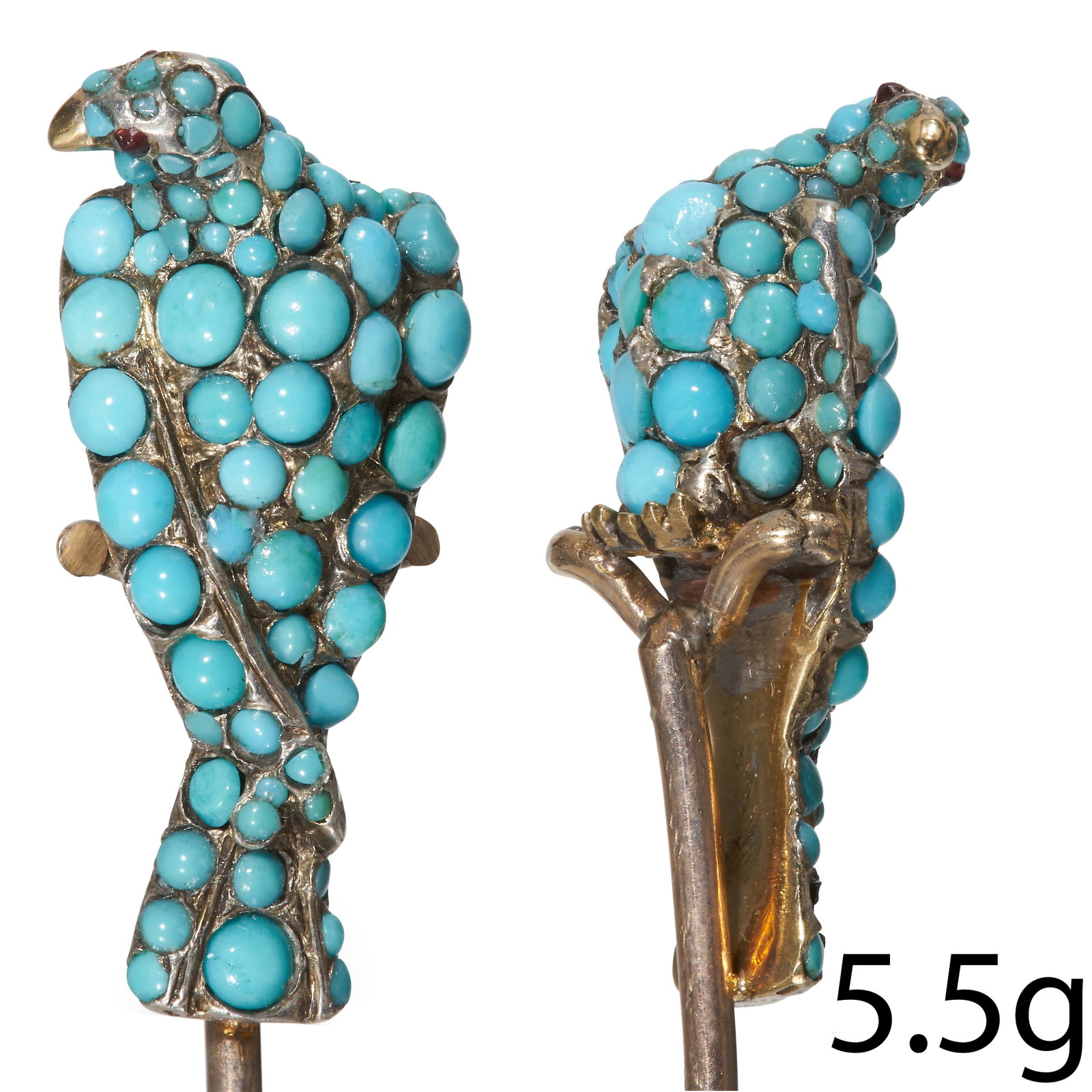 ANTIQUE GOLD, TURQUOISE EAGLE STICK PIN: ANTIQUE GOLD, TURQUOISE EAGLE STICK PIN. Throughout set with turquoise.Realistically modeled as an eagle.L. 9.1 cm.5.5 grams.